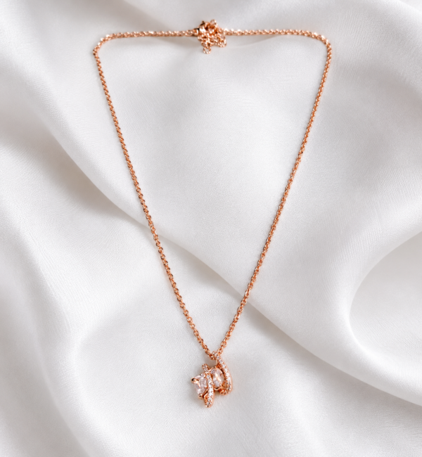 10CH0250 Rose-Tone Sculptural Crystal Pendant Necklace
