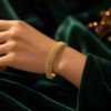 Radiant Gold-Tone Mesh Bangle
